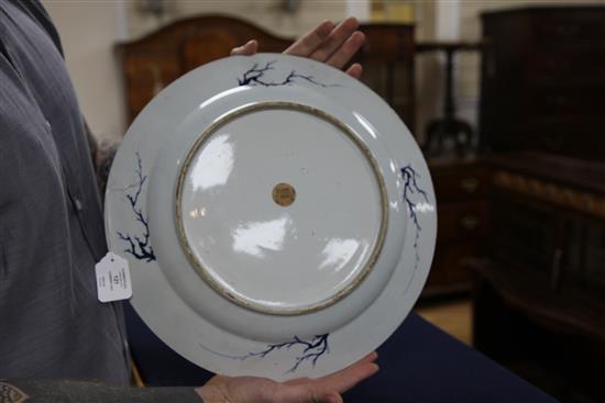 A Chinese export blue and white circular dish, Kangxi / Yongzheng period, 41cm, restorations